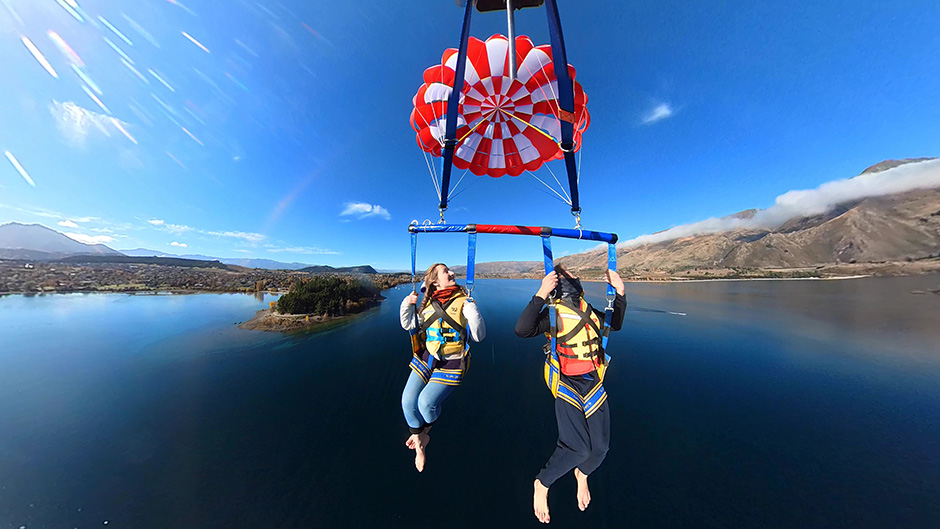 Join the friendly and experienced crew at Wanaka Parasailing for a truly memorable scenic parasail across Lake Wanaka or Lake Hawea.