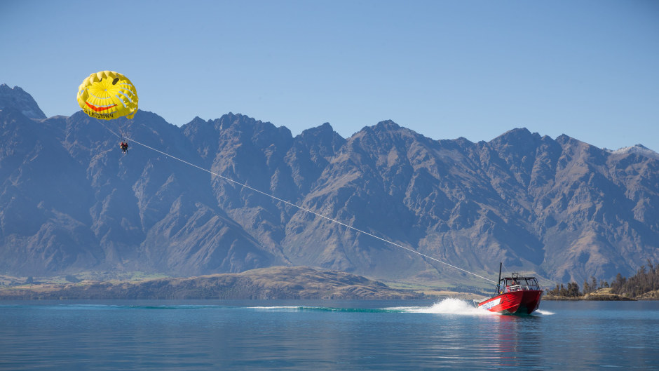 FLY HIGH STAY DRY! 
We will fly you high above Lake Wakatipu so you can enjoy the breathtaking views that surround you with your friends or family!  Taking off and land onboard our purpose built parasailing boat the Red Dragon. This is an absolute must do whilst in Queenstown!