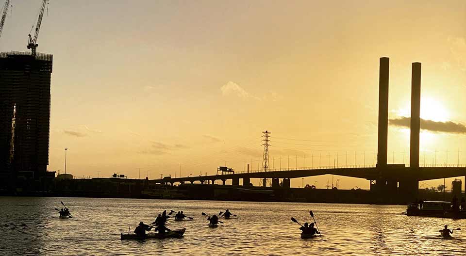 Kayaking is the perfect way to take in the sights of Melbourne City and what better time to do it than as the sun sets.