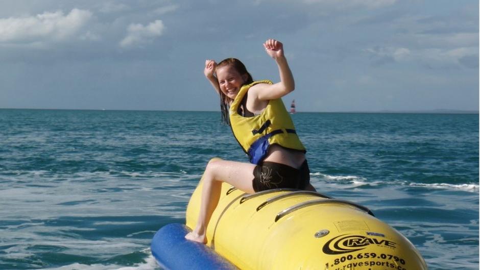 Join us for an exhilarating ride on a giant inflatable banana in the warm waters of Hervey Bay!