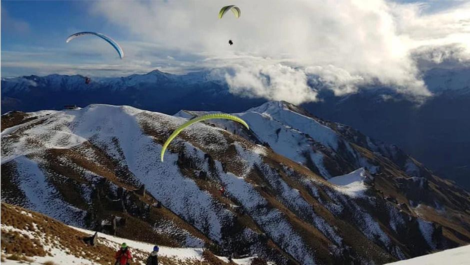Discover one of the most scenic places in the world by an incredible paragliding or hang gliding adventure - an unmissable experience!