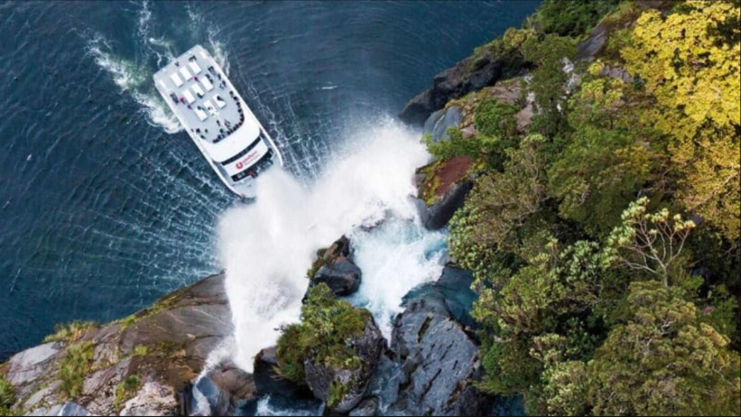 Milford Sound Cruise beneath waterfall