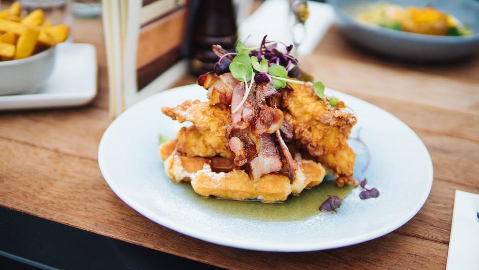 Treat yourself to a delicious brunch of Chicken n Waffles with either a coffee or a mimosa.