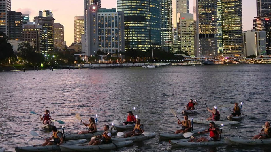 Discover Brisbane in a new light as you paddle down the river during twilight.