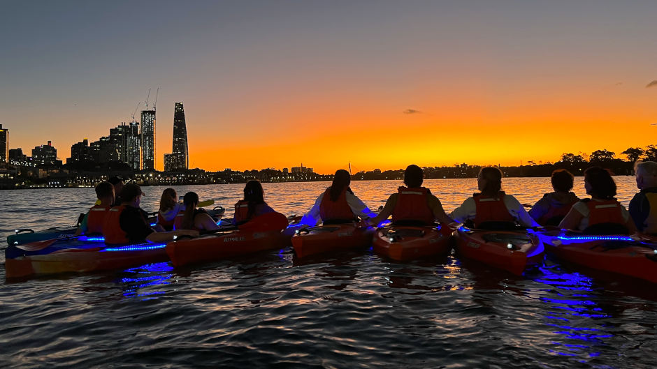 Watch the sunset over the Sydney Harbour as you paddle through the calm waters
