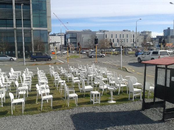 wit chairs for those who lost hair lives in the adjacent empty CTV building site.